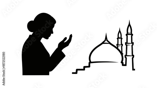 Woman in prayer beside mosque silhouette.