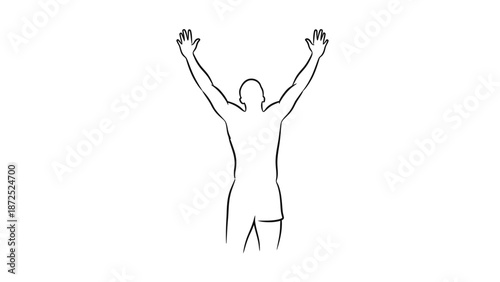 Man standing with arms raised high.
