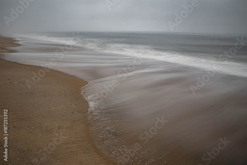 Wallpaper Mural Minimalist seascape with soft ocean waves on empty beach, calm and peaceful background Torontodigital.ca