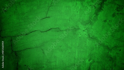 Vivid, textured green surface with pronounced cracks creates a bold abstract backdrop. Ideal for nature-inspired, eco-friendly, or modern design projects needing a striking green texture.
