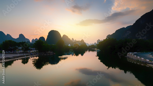 Fotografija Sunset Over River with Karst Peaks and Reflections