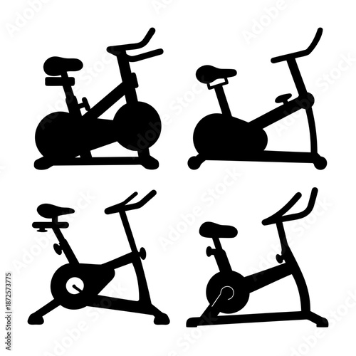 Collection of black silhouettes depicting various stationary exercise bikes for fitness training