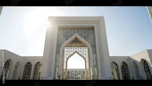 Ornate Mosque Entrance with Archway and Windows.