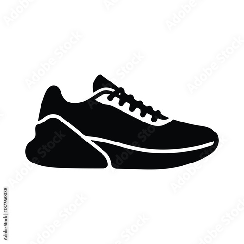 A simple black and white silhouette of a modern running shoe side view isolated design
