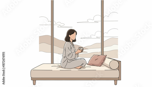 Woman relaxing on a daybed by the window with a tablet.