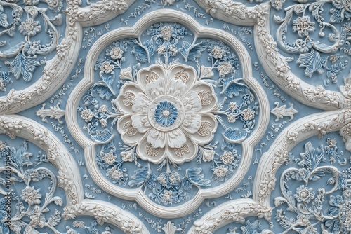 Intricate pale blue and white bas-relief ornamentation showcases detailed floral patterns