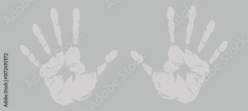 Pair of white handprints on a gray background representing identity uniqueness and human connection