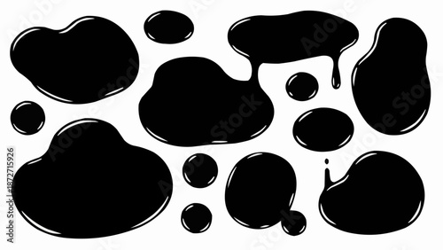 Collection of black liquid blobs and drips.