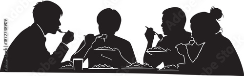 Silhouette of family eating dinner together at a table