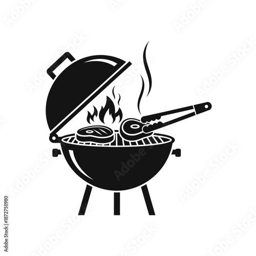 Barbecue Grill Cooking Steaks with Tongs and Flames