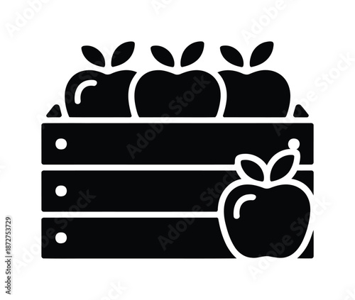 A vector illustration of apples in a wooden crate with one apple placed outside the crate