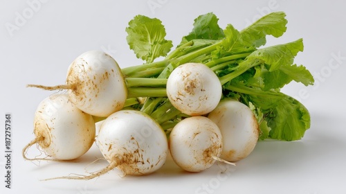 Fresh white turnip root vegetable isolated on a clean white background, crisp and organic produce for healthy cooking, vegetarian meals, and natural food photography