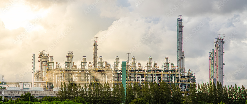 Obraz premium Oil and Gas Industrial zone,The equipment of oil refining,Close-up of industrial pipelines of an oil-refinery plant,Detail of oil pipeline with valves in large oil refinery.