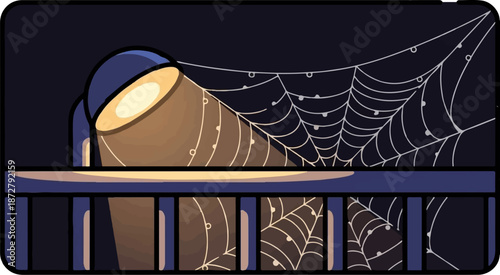 A spotlight illuminates a cobweb-covered railing at night