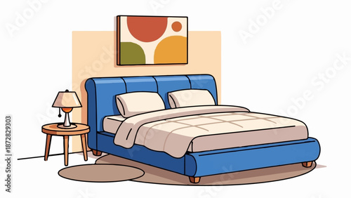 Blue bed with white linens, bedside lamp, round table, and abstract art