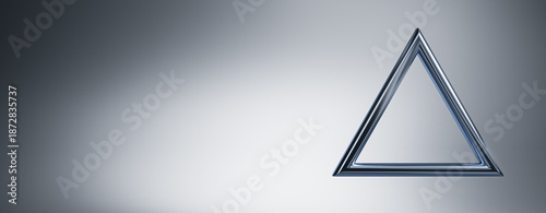 Metallic triangle frame with modern gradient background and empty copy space ...