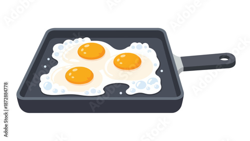 Three freshly cracked eggs sizzling in a flat griddle pan ready for a hearty breakfast meal