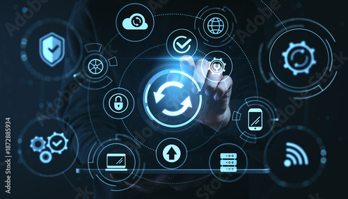 Wallpaper Mural Digital transformation concept with hand interacting with sync icon among technology symbols on modern digital interface background. Torontodigital.ca