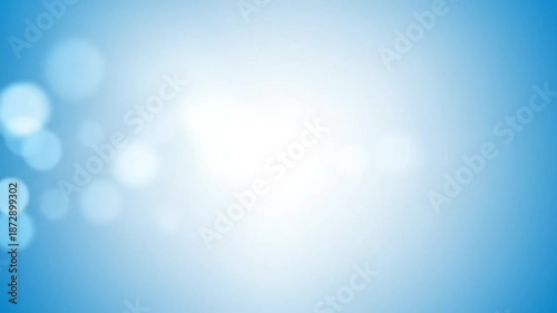 Capturing 4K Video footage of a serene blue background with bokeh effect in a studio