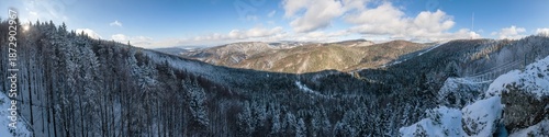 Breathtaking winter panorama from Skalka with view of Via Ferrata bridge and hiking trails, Slovakia