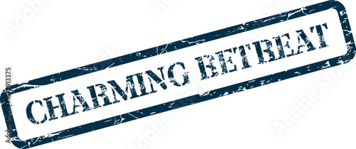 This inviting blue textured rubber stamp displays the words Charming Retreat for special getaways