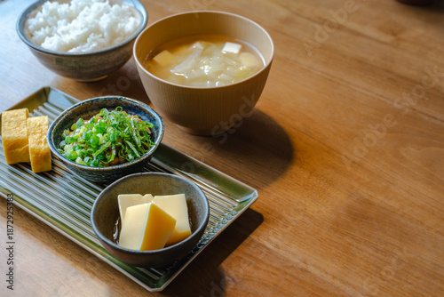 Photos Healthy Japanese breakfast with natto and miso soup with copy space