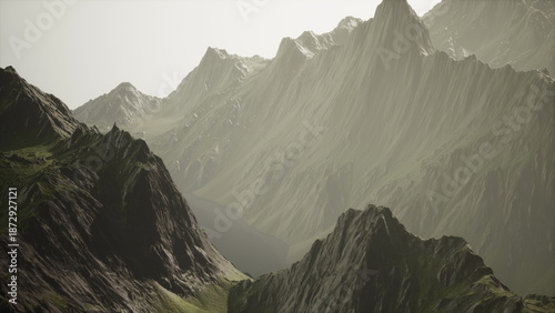 Bilde på lerret Mountains rise dramatically into the sky, showcasing jagged rock formations and lush greenery at the base