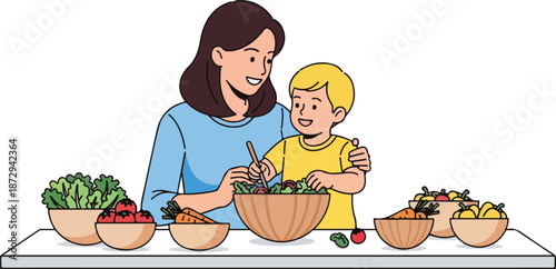 Mother and son preparing a healthy salad together in kitchen