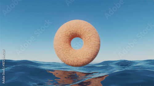 fluffy peach donut floating on water surface