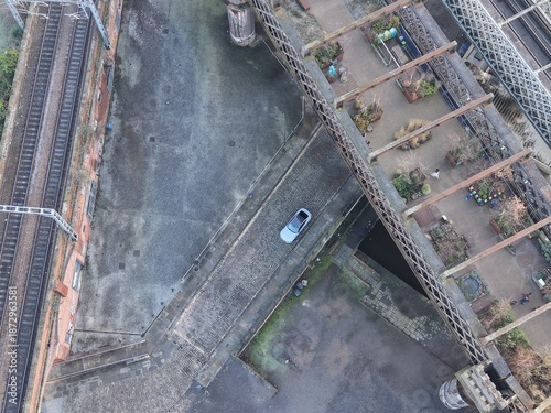 Aerial top down view of railway bridges and industrial buildings in Manchester city centre. Manchester England. 