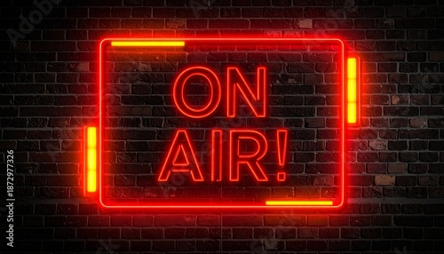 Illuminated ON AIR neon sign glowing brightly against a dark brick wall background, symbolizing broadcasting and live performance