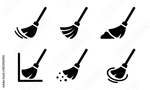 Collection of black broom icons showing different cleaning actions and scenarios