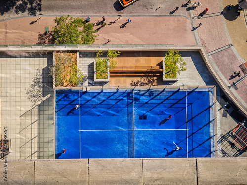 Padel court from above. Aerial view of padel tennis court from balcony of skyscraper. Padel court in Dubai Marina