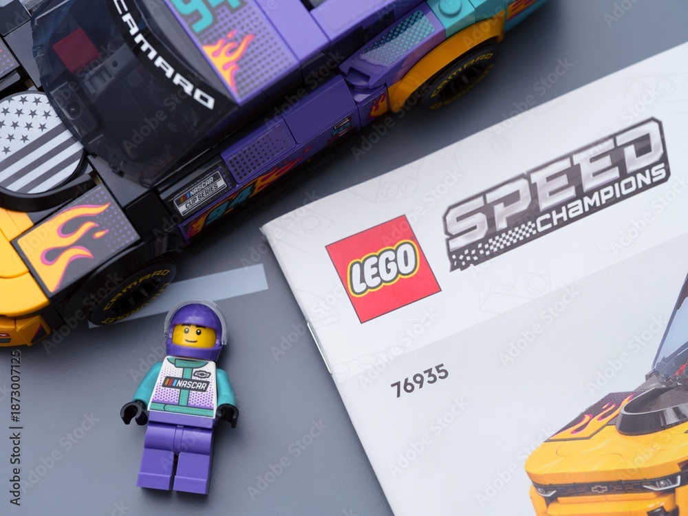 Fototapeta premium Tambov, Russian Federation - January 04, 2026 Lego Speed Champions kit with Nascar Next Gen Chevrolet Camaro car, driver minifigure and it instruction book