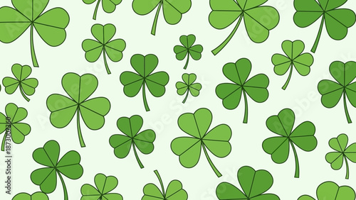 A collection of green clover leaves scattered across a light background