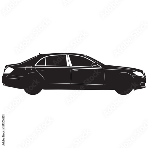 Sleek black car silhouette driving on open road at night