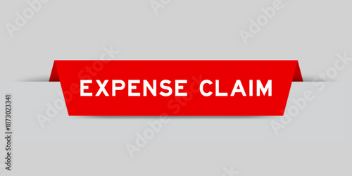 Red color inserted label with word expense claim on gray background
