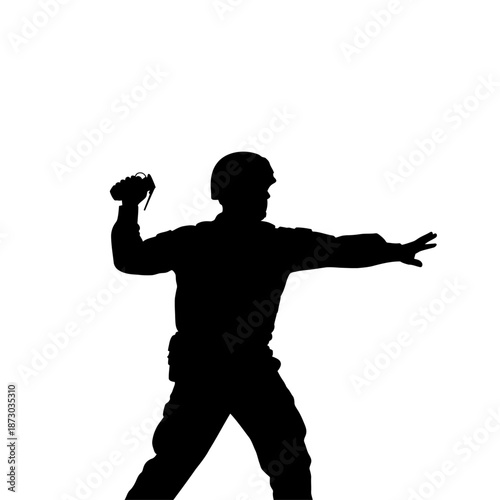 Silhouette of a man throwing a grenade