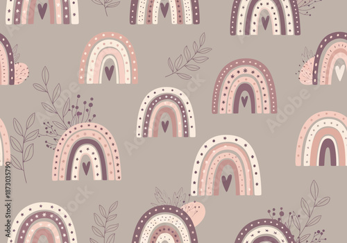 A pattern of pink and purple rainbows on a gray background with hearts and dots