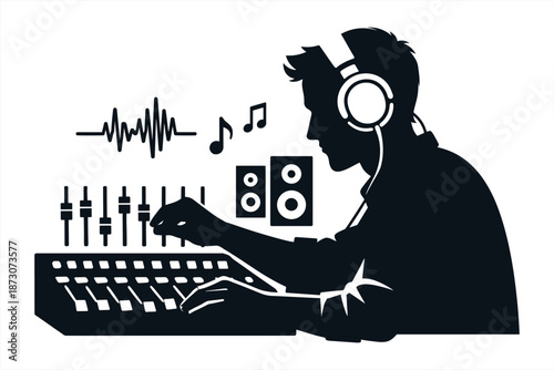 Silhouette of young male dj mixing music with headphones in studio