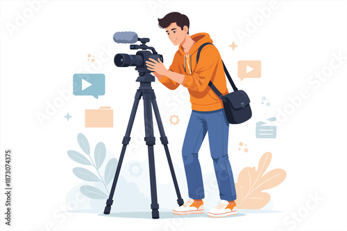 Young caucasian male filmmaker operating video camera on tripod