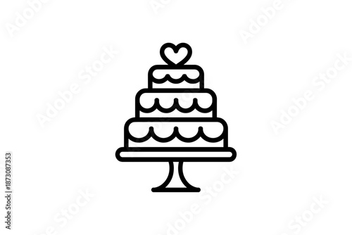 A three-tiered cake with a heart on top is displayed.