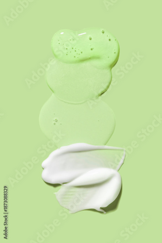 Beauty products sample set 5 stages Korean skincare routine method collection. Beauty product palette on green background