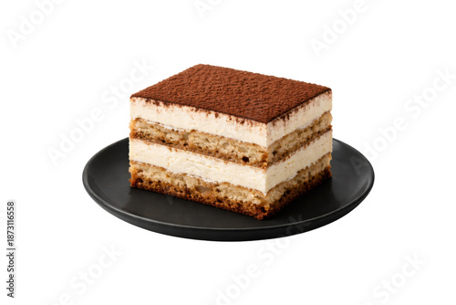 Quadro su tela single slice of tiramisu cake served on a black plate, showing layered mascarpone cream, coffee-soaked sponge, and a smooth cocoa topping