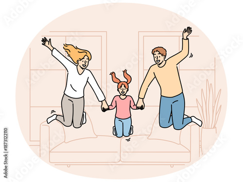 Happy family jumping together in living room of own apartment after moving or buying new home. Joyful family of loving mother and father with little daughter became owners of cozy apartment