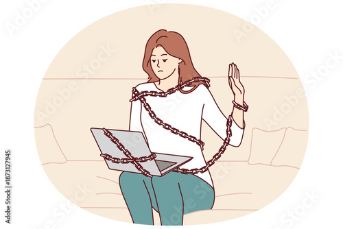Addicted woman with laptop sits on couch chained for internet dependent concept. Addicted freelance girl working from home suffers from work overload and strict deadlines causing problems