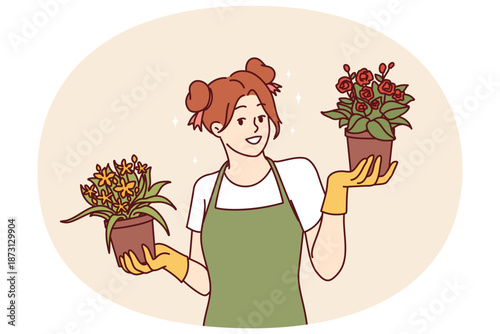 Woman florist with flowers in pots offers to purchase home plants to decorate interior of apartment. Happy girl in apron works as florist or gardener and owns own business and greenhouse