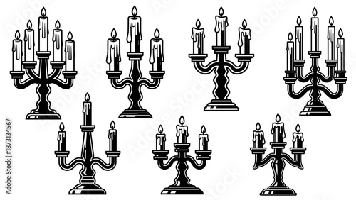 Collection of Vintage Candelabras with Burning Candles.