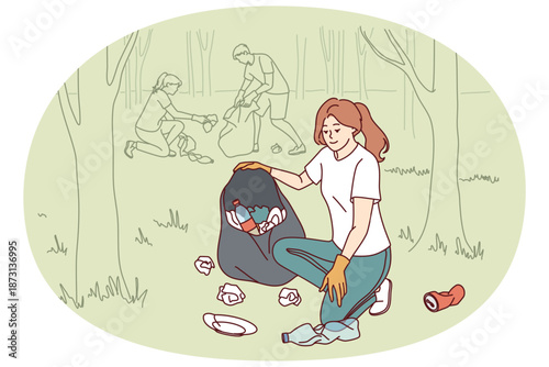 Woman volunteer collects garbage in bag, cleaning park from plastic non-degradable waste. Girl volunteer defender of wildlife is in forest picking up bottles and waste from ground.