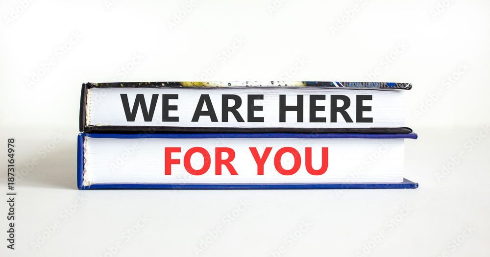 Fototapeta premium Support, help and we are here for you symbol. Concept words We are here for you on beautiful books. Beautiful white paper background. Business we are here for you concept. Copy space.